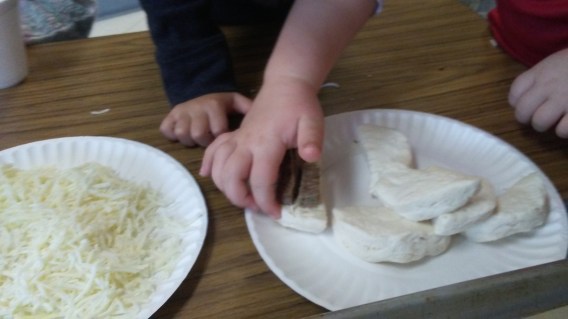 making cheese steaks rolups